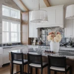 Custom luxury home in SE Idaho with large windows and stone hood by MDS Homes